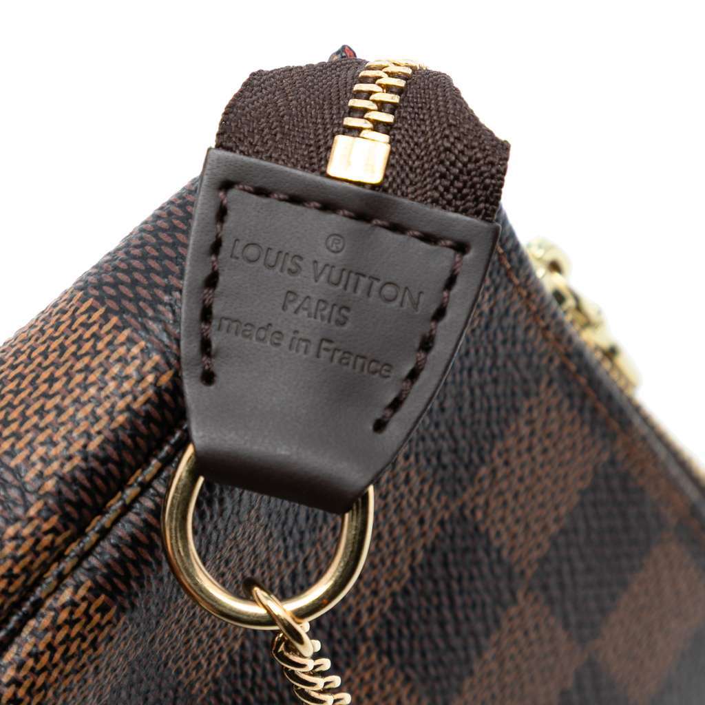 Louis Vuitton Damier Ebene Mini Pochette Accessoires Brown Very good condition - Box View