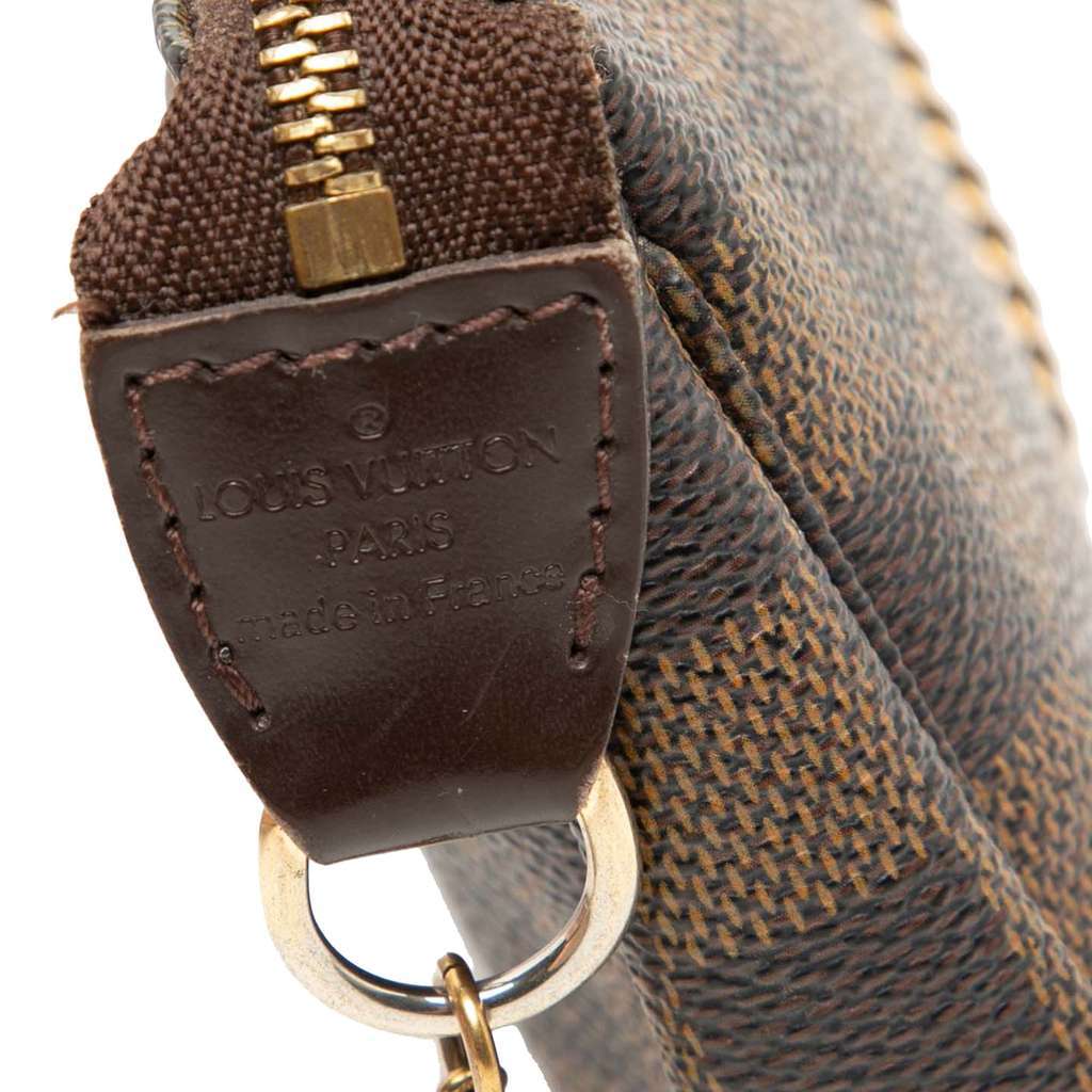 Louis Vuitton Damier Ebene Mini Pochette Accessoires Brown Very good condition - Box View