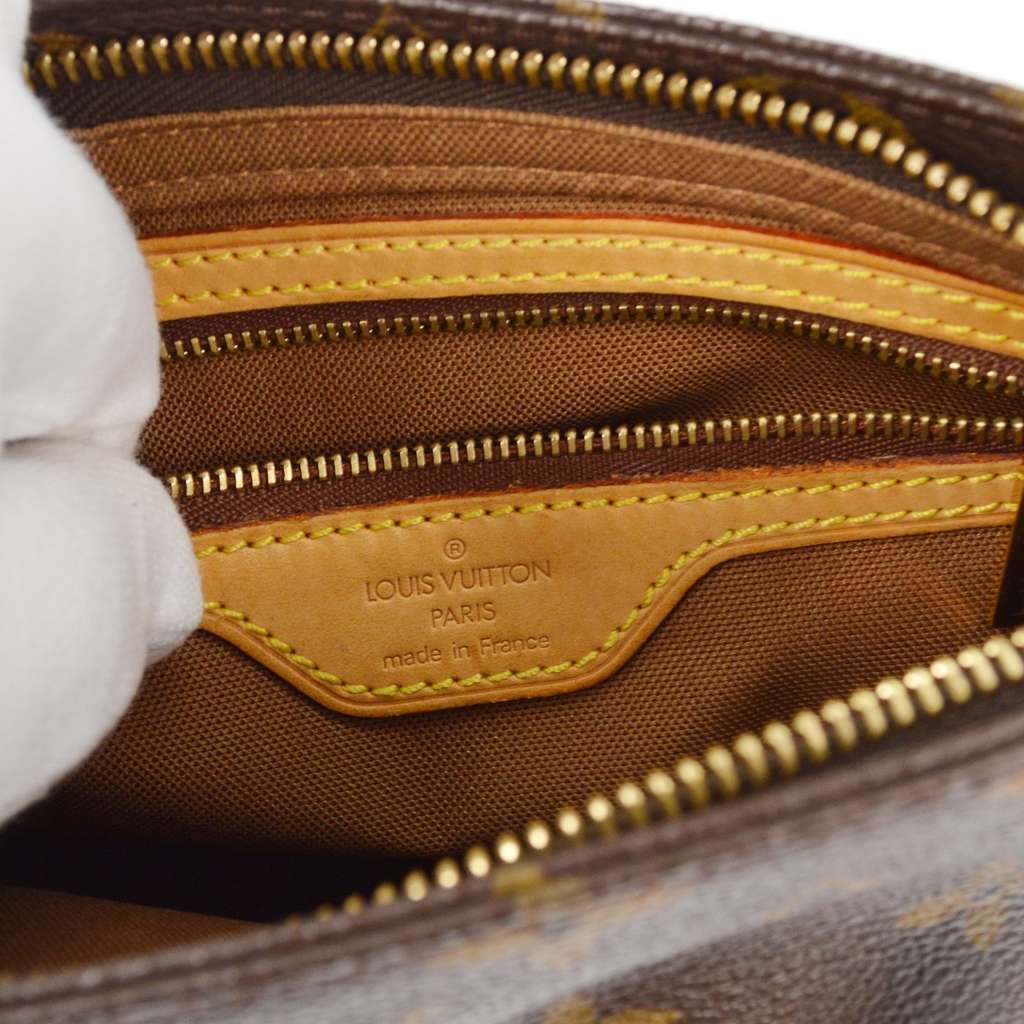 Louis Vuitton Trotteur Handbag Brown Canvas Good - Model View