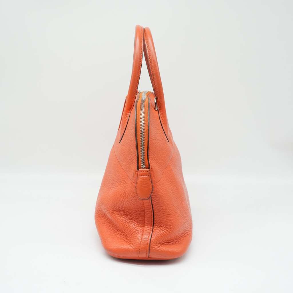 Hermès Bolide 31 Handbag In Potiron Orange Clemence Leather Orange Good - Model View