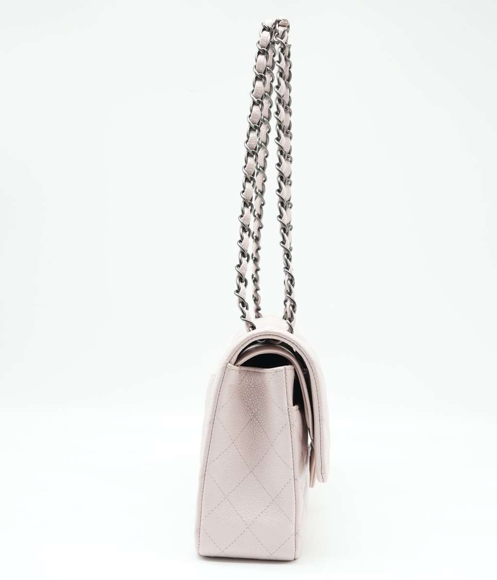 Chanel Classic Medium Flap Nude Caviar Leather Bag with Ruthenium Hardware Size 25 Beige Leather Good condition - Model View