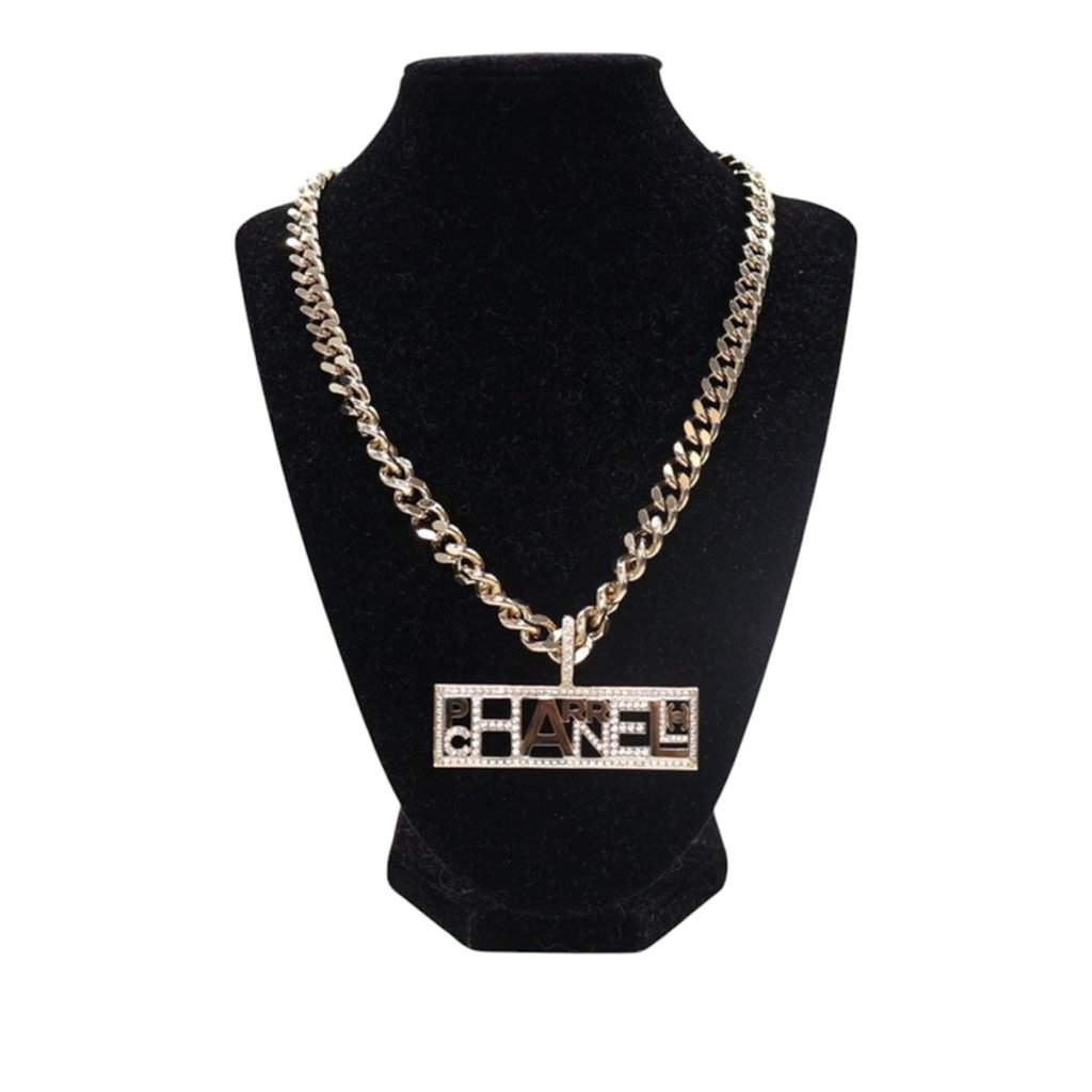 Chanel Pharrell Gold Plated Strass Chain Letters Pendant Necklace Gold Metal Very good condition - Front View