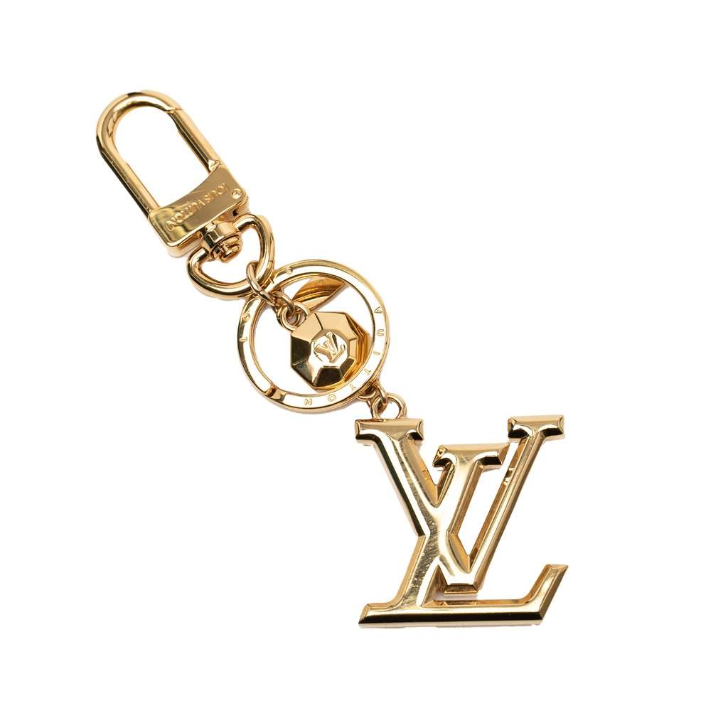 Louis Vuitton Gold Plated LV Facettes Bag Charm and Key Holder Gold Metal Very good condition - Front View