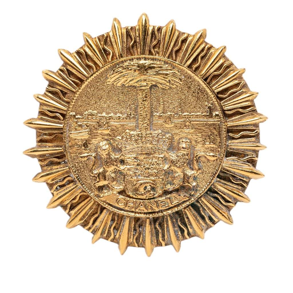 Chanel Gold Plated Coat Of Arms Medallion Sunburst Brooch Gold Metal Very good - Front View