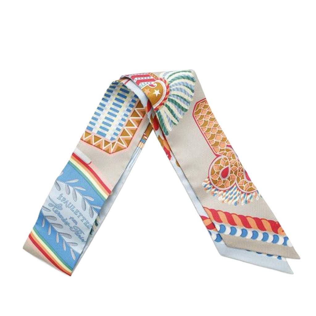 Hermès Epaulettes de Gala Silk Twilly Scarf Blue Silk Very good condition - Front View