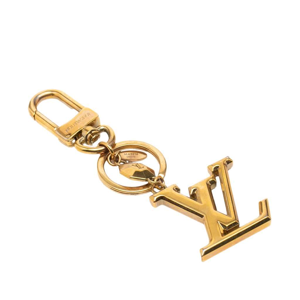 Louis Vuitton Gold Plated LV Facettes Bag Charm and Key Holder Gold Metal Very good condition - Front View