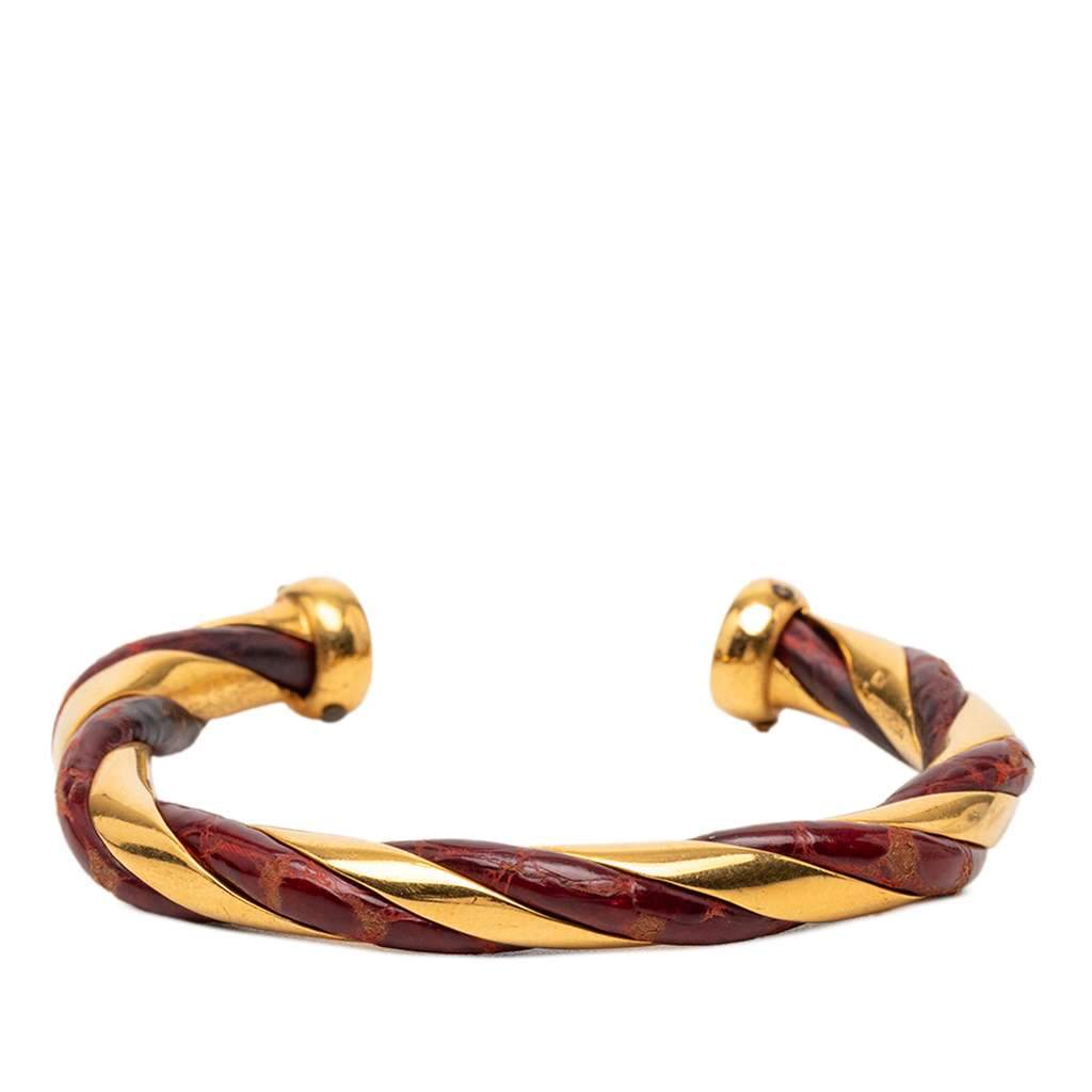 Hermès Gold Plated and Leather Twisted Cuff Bracelet Gold Metal Very good - Front View