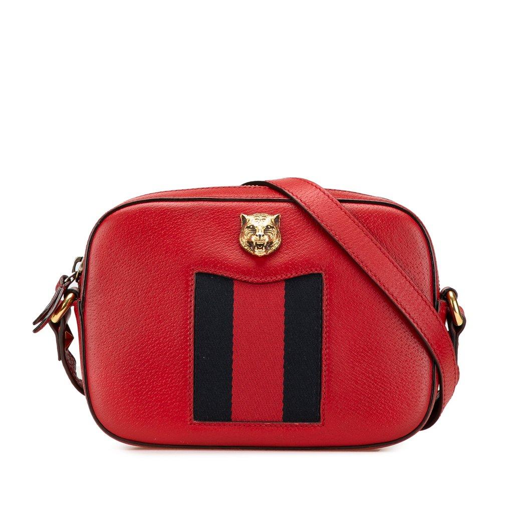 Gucci حقيبة كروسبودي جلدية بنقشة جلد حيوانية وحزام منسوج بتصميم ديسكو