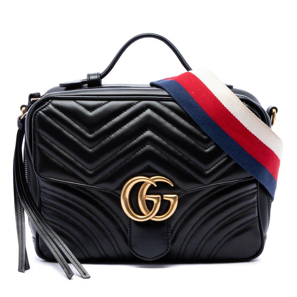 Gucci حقيبة سيلفي صغيرة بمقبض علوي من جلد العجل المبطن بنقشة GG مارمونت