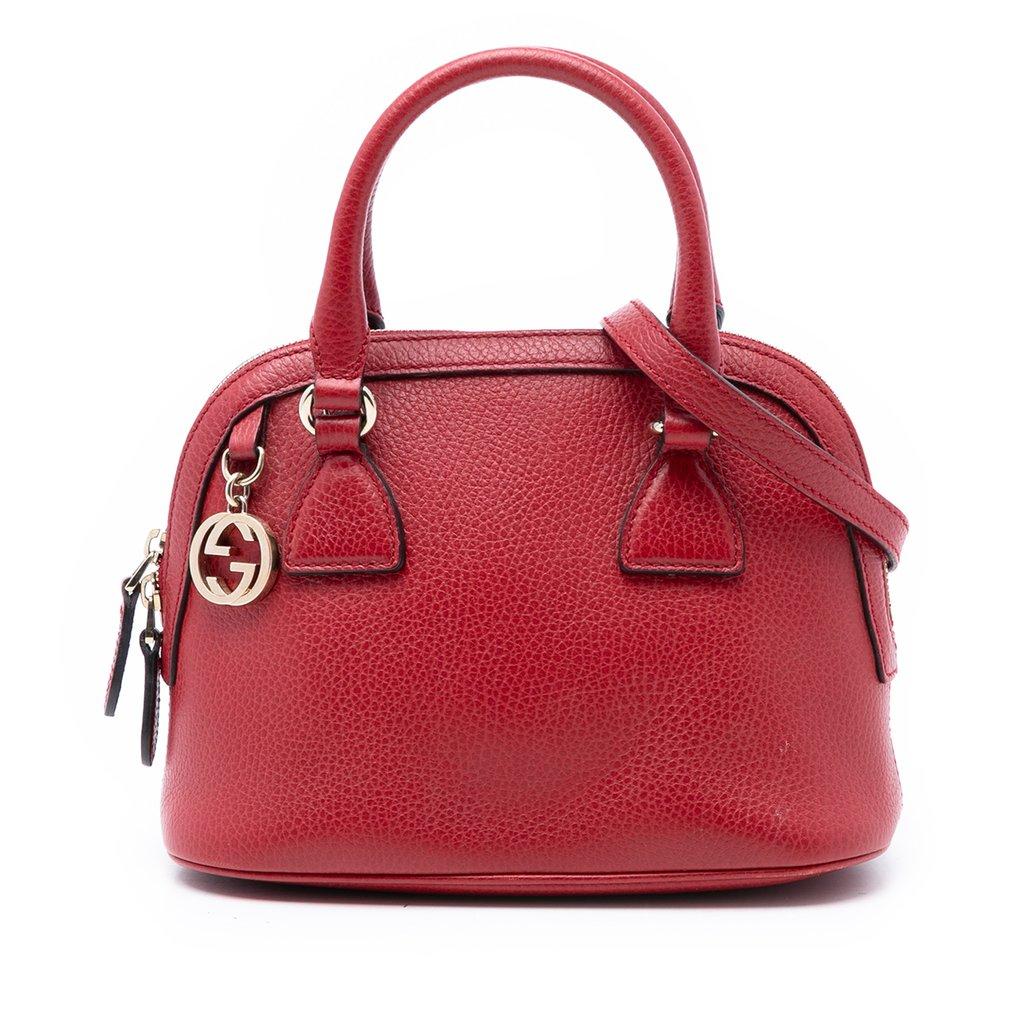Gucci حقيبة صغيرة من الجلد بتصميم قبة مزينة بشعار GG