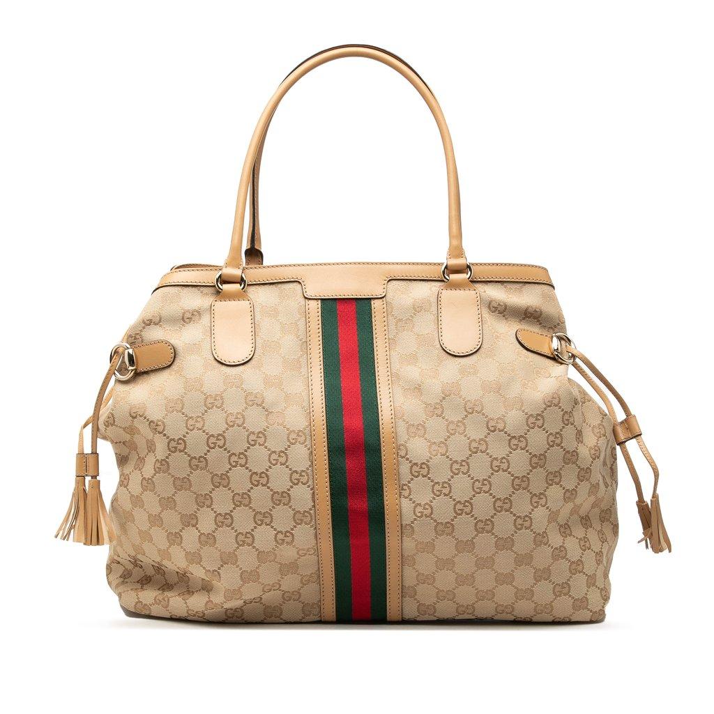 Gucci حقيبة قماشية مزينة بشرابة من قماش GG