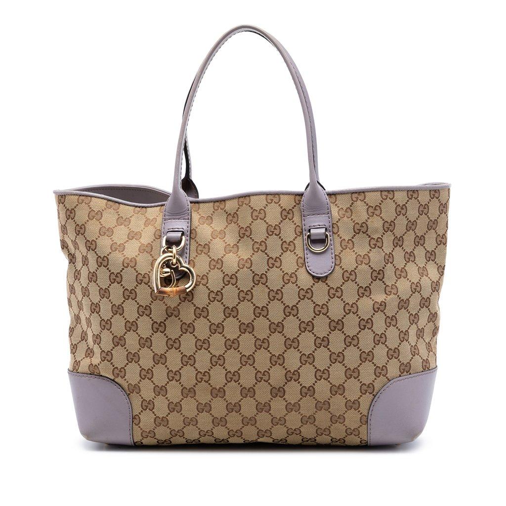 Gucci حقيبة قماشية بنقشة قلب من قماش GG