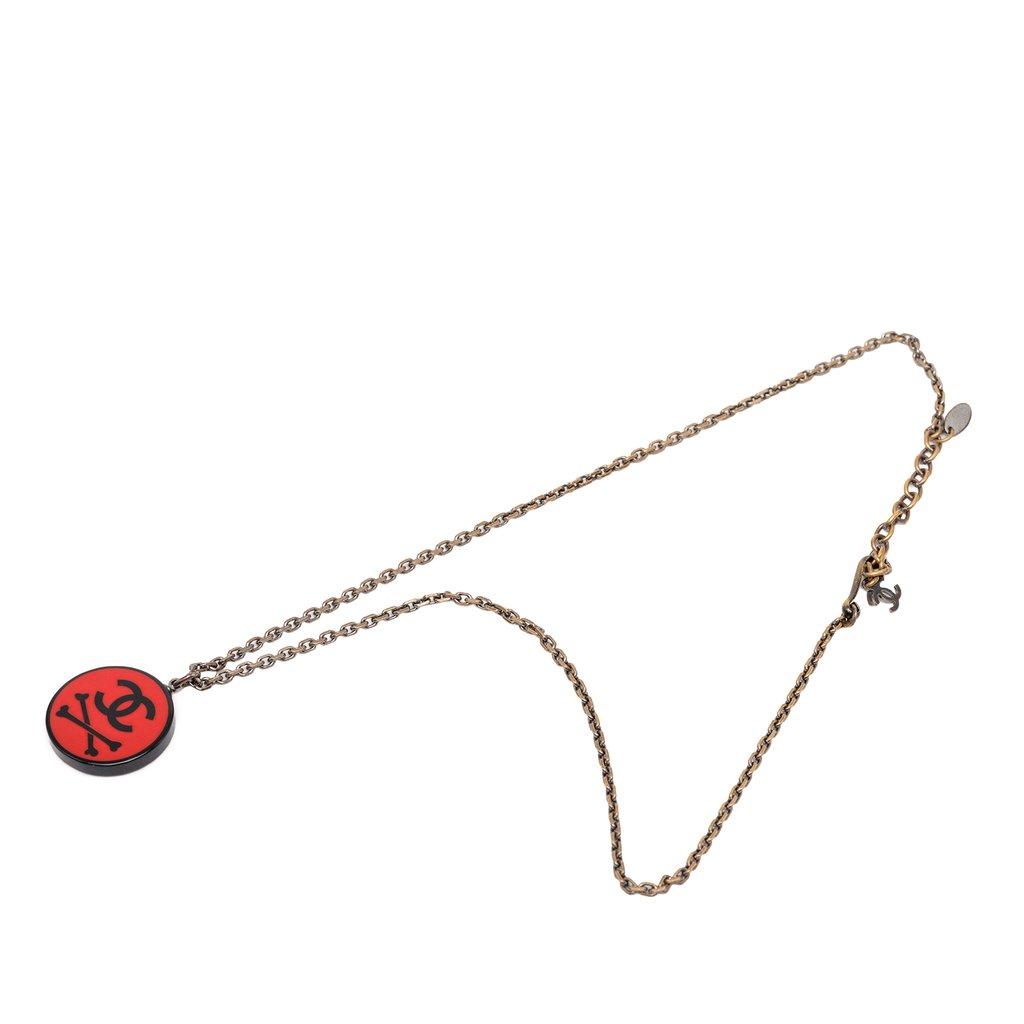 Chanel CC Gold Plated Resin Crossbones Round Pendant Necklace