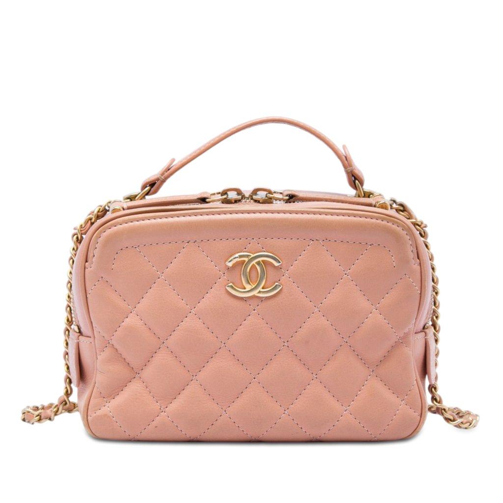 Chanel حقيبة زينة صغيرة من جلد العجل المبطن بشعار CC، بمقبض علوي وسلسلة