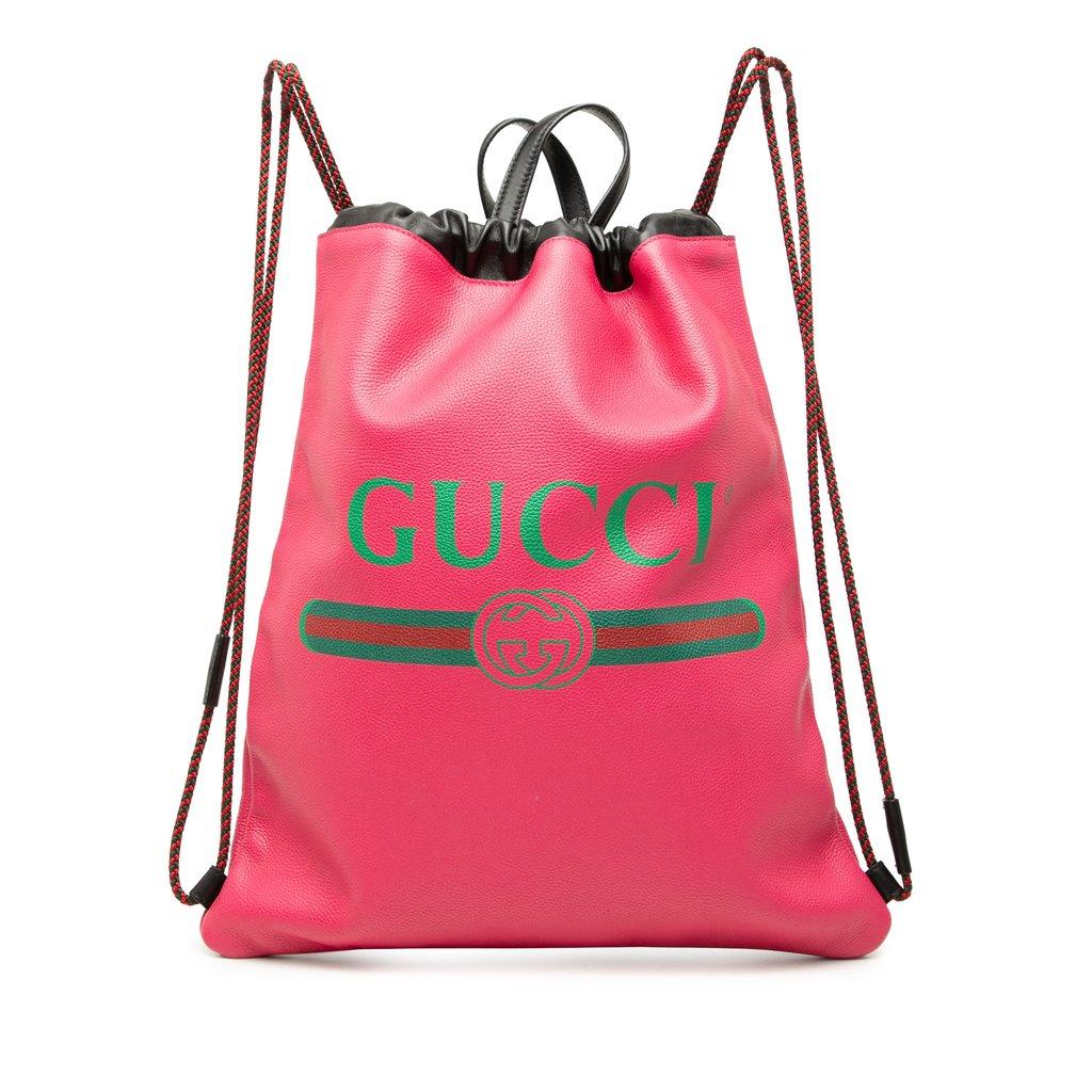 Gucci حقيبة ظهر برباط وشعار من الجلد
