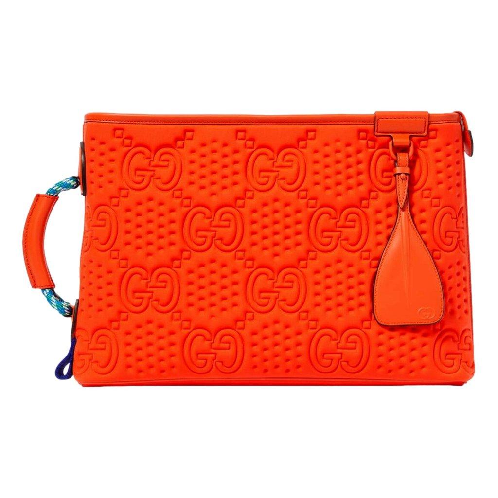 Gucci Gucci Off The Grid GG Embossed Orange Rubber Pouch Clutch Bag