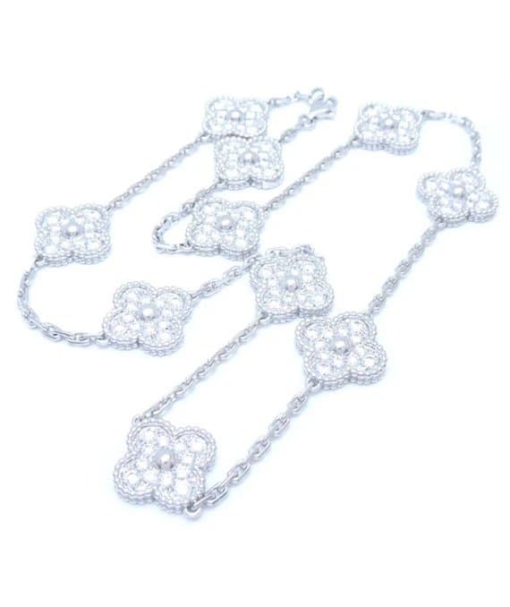 Van Cleef & Arpels قلادة عتيقة من الذهب الأبيض عيار 18 قيراطًا مرصعة بعشرة زخارف من ألماس الحمراء