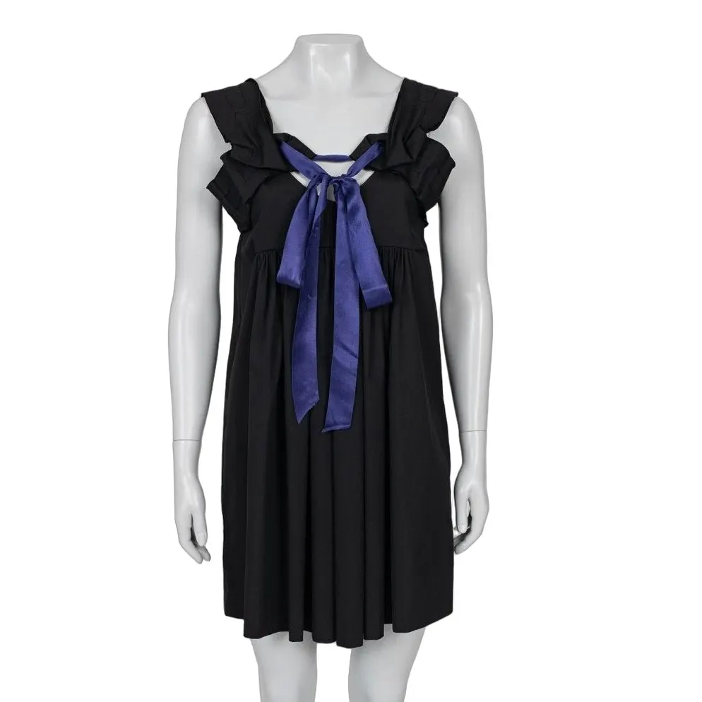 Miu Miu Chic Black Dress with Playful Purple Bow - Size 40/S Pre-owned Black Cotton Good - Front View