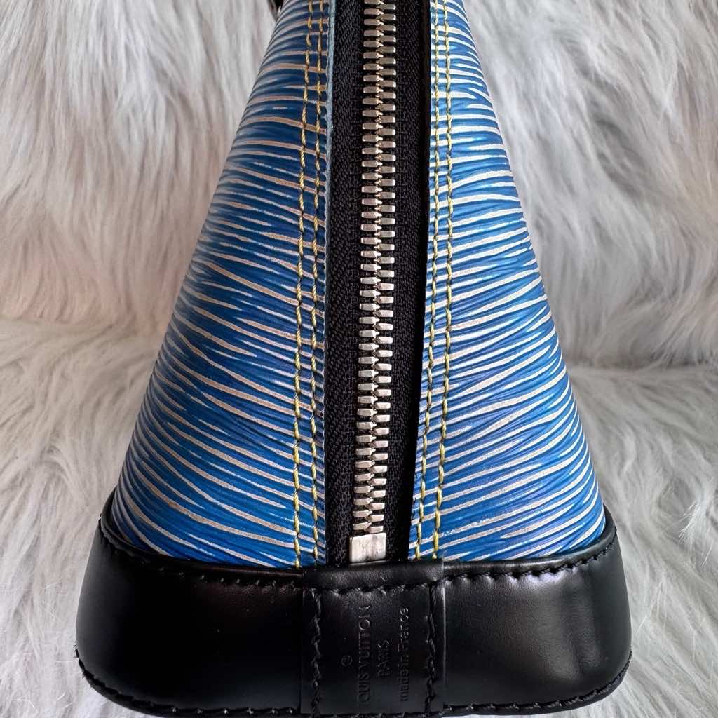 Louis Vuitton Blue Epi Alma BB - Side view