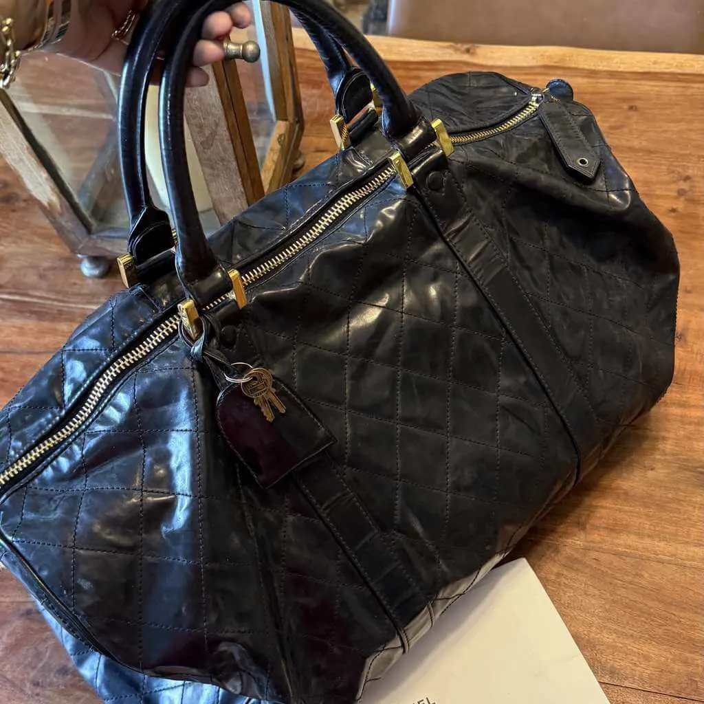Chanel Unisex Travel Bag Black Leather Good - Back View