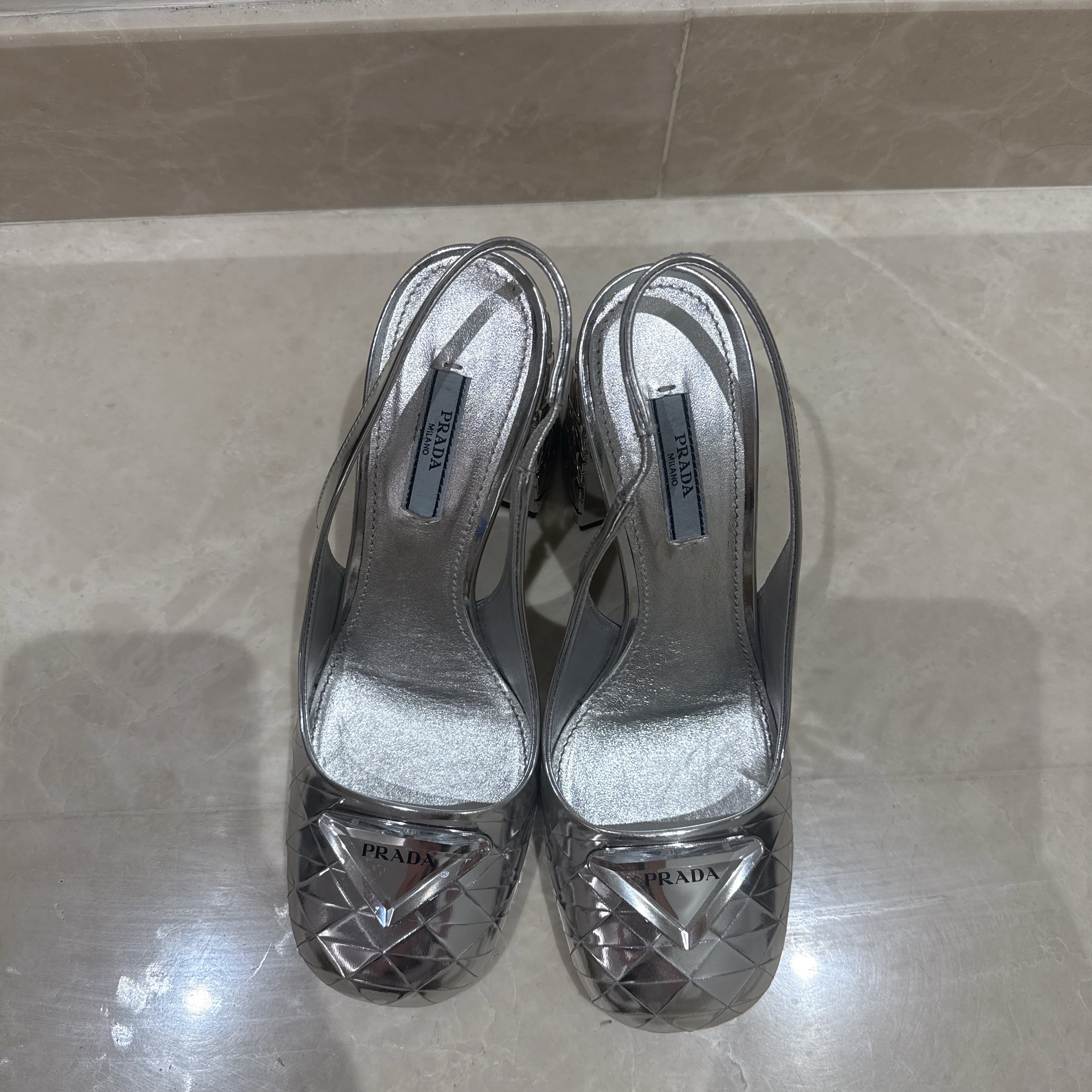 Prada Prada Metallic Slingback Heels Silver Leather Very good condition - Model View