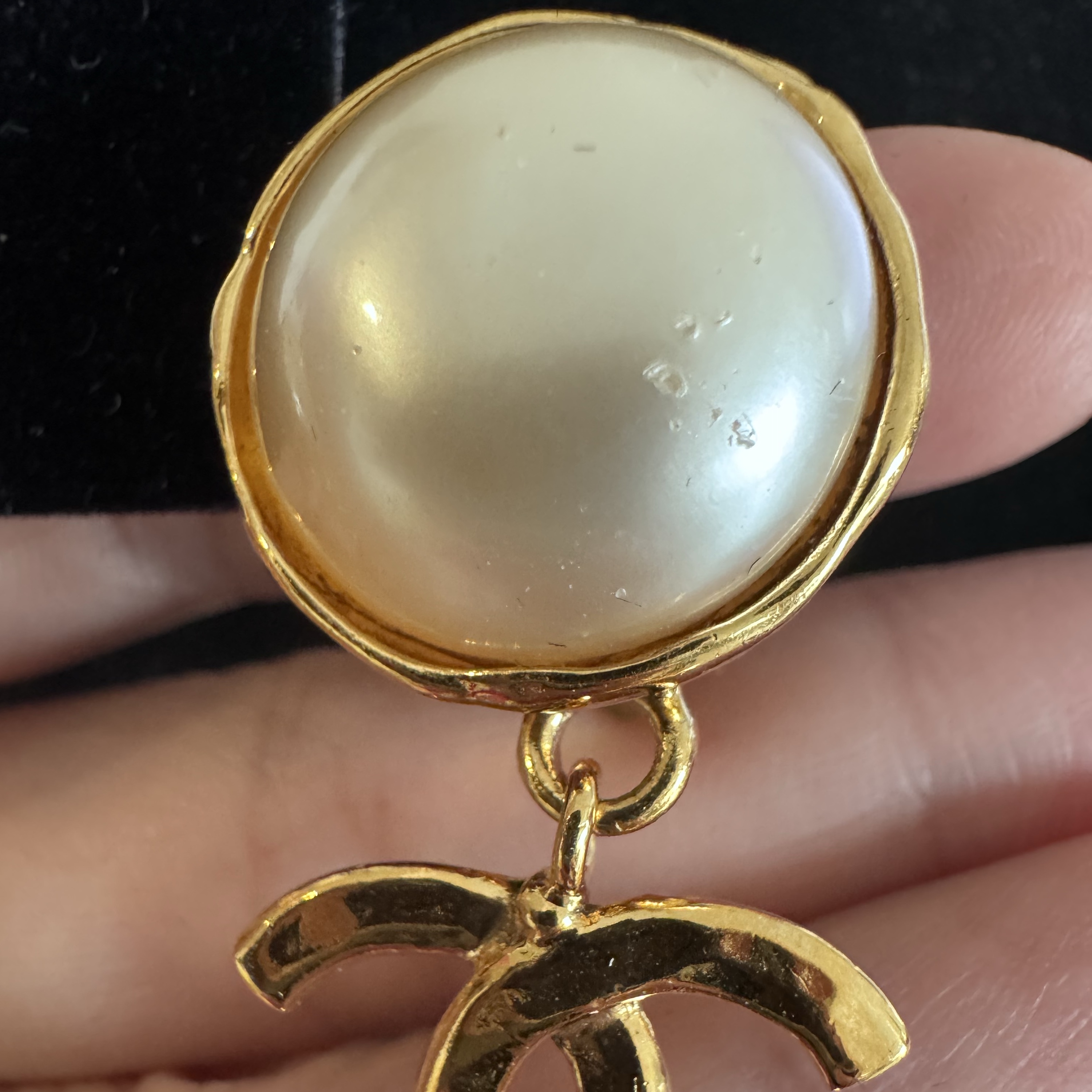 Chanel CC Logo Pearl Earrings Gold Never worn - Model View