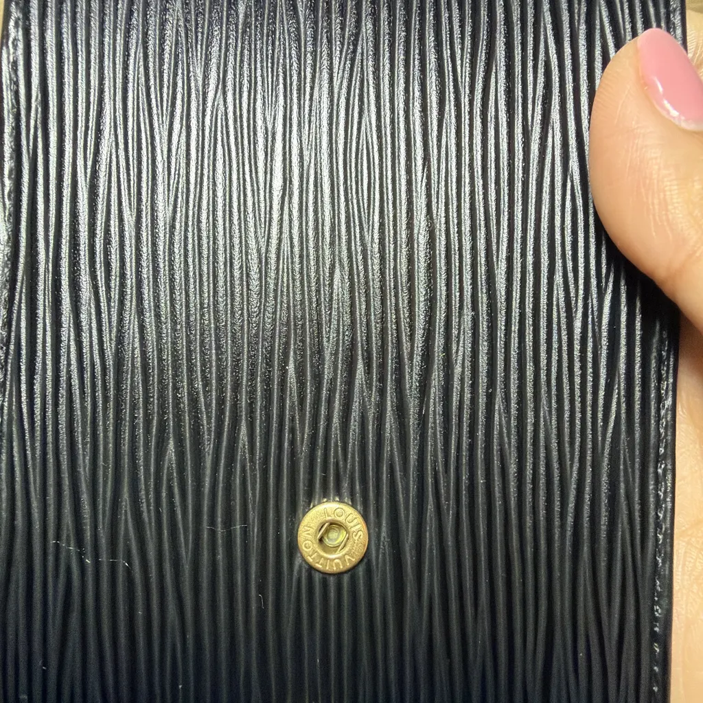 Louis Vuitton Epi Wallet Black Good - Model View