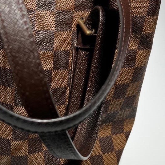 Louis Vuitton Marais Bucket - Side view