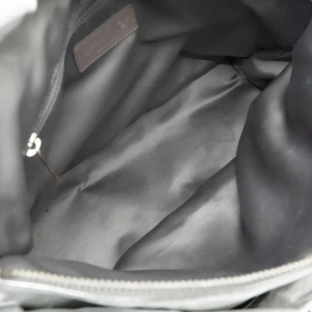 Chanel Vintage Rodeo Drive Hobo Metallic Leather Fair - Model View