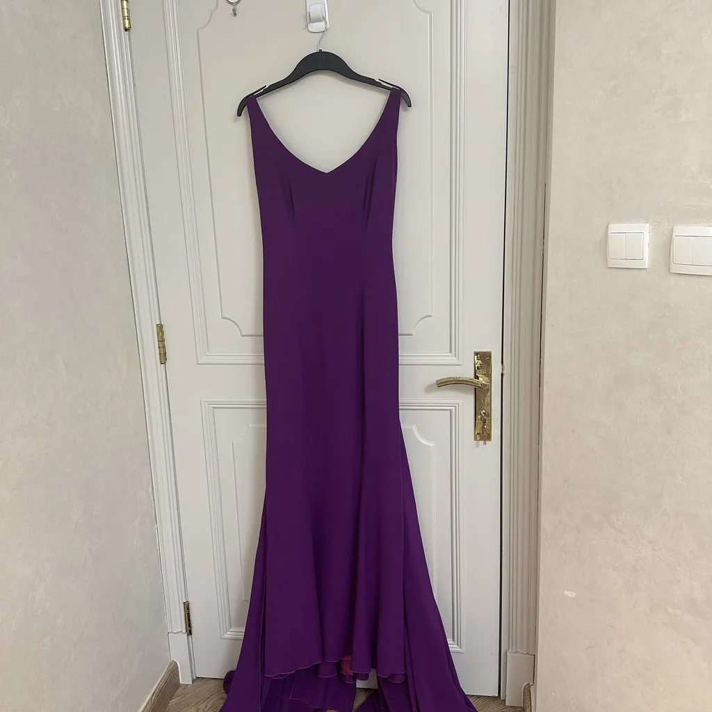 Unsigned Authentic Antonio Riva Milano couture gown, circa 2017. Listed under Unsigned only because Antonio Riva is not currently available in the Libas brand list. Purple Polyester Very good - Model View