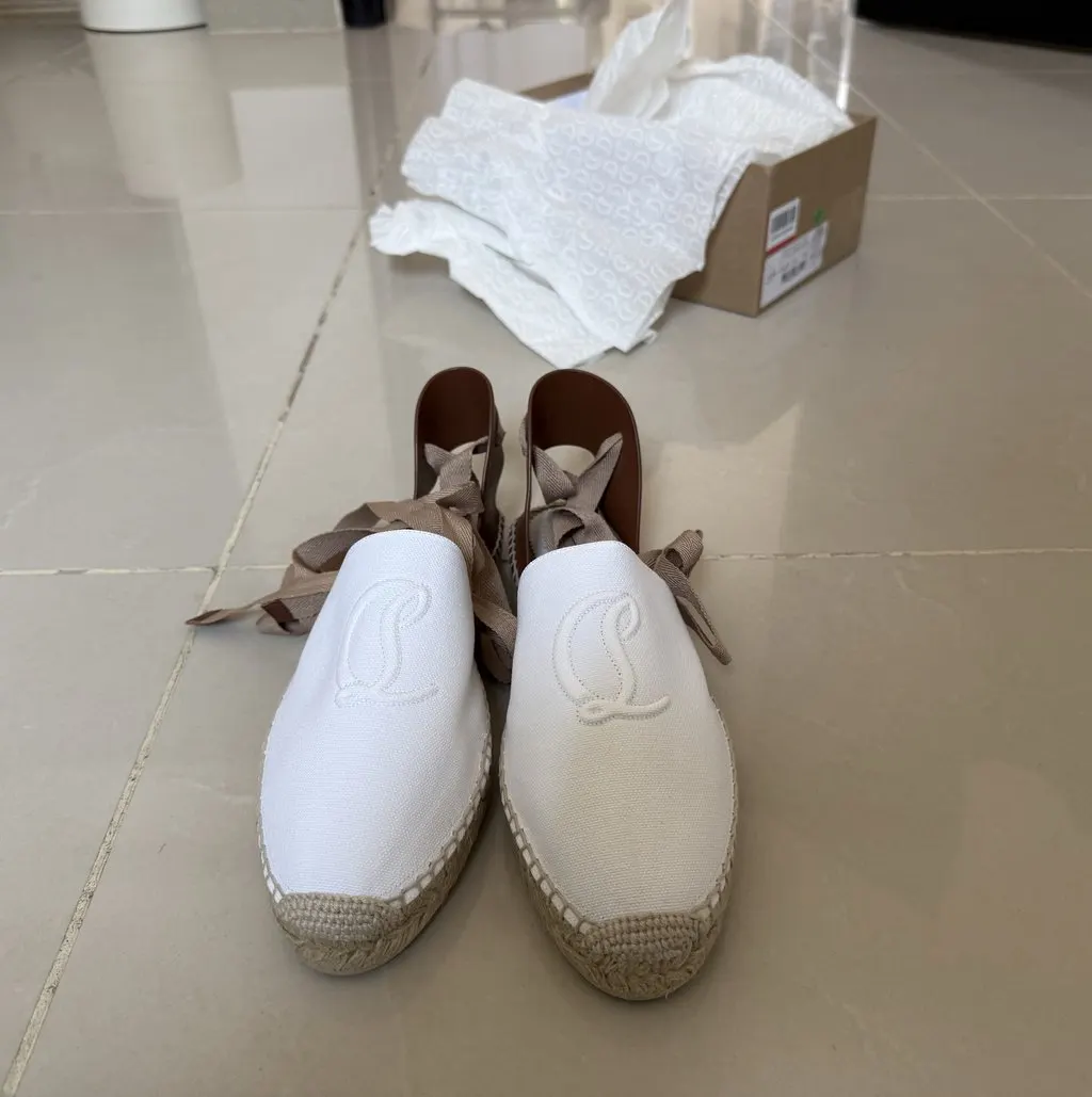 Christian Louboutin Brand New White Canvas Never worn, with tag - Model View