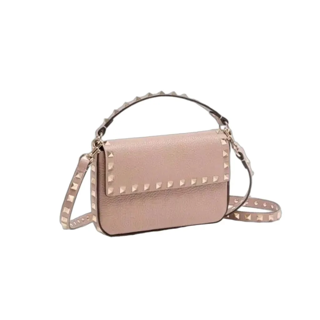 Saint Laurent valentino garavani rockstud grainy pouch Pink Leather Never worn - Front View