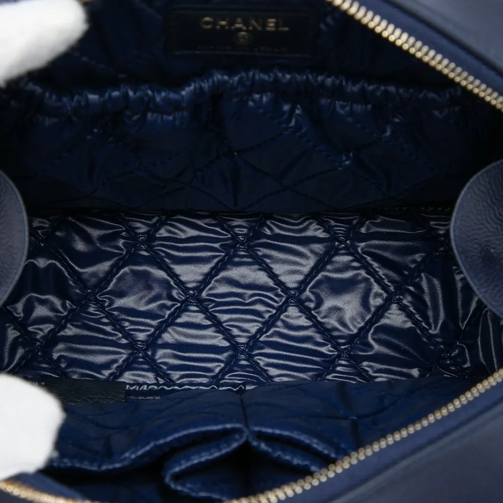 Chanel Large Quilted Caviar Curvy Cosmetic Pouch Blue Leather Very good - Model View