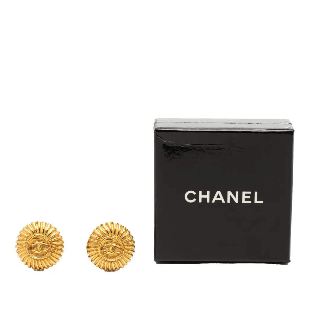 Chanel Gold Plated CC Sunburst Clip On Earrings Gold Metal Very good - Model View