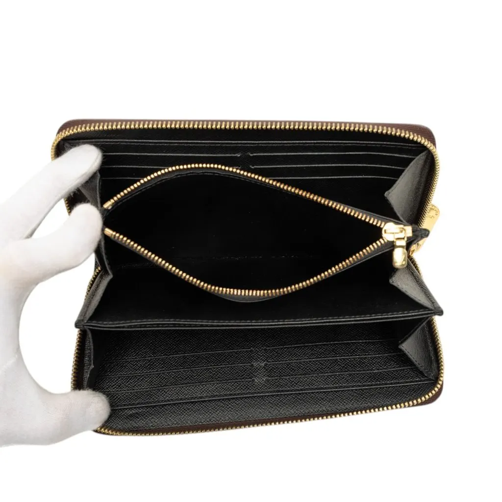 Louis Vuitton Monogram Giant Reverse Zippy Long Wallet Brown Canvas Good - Model View