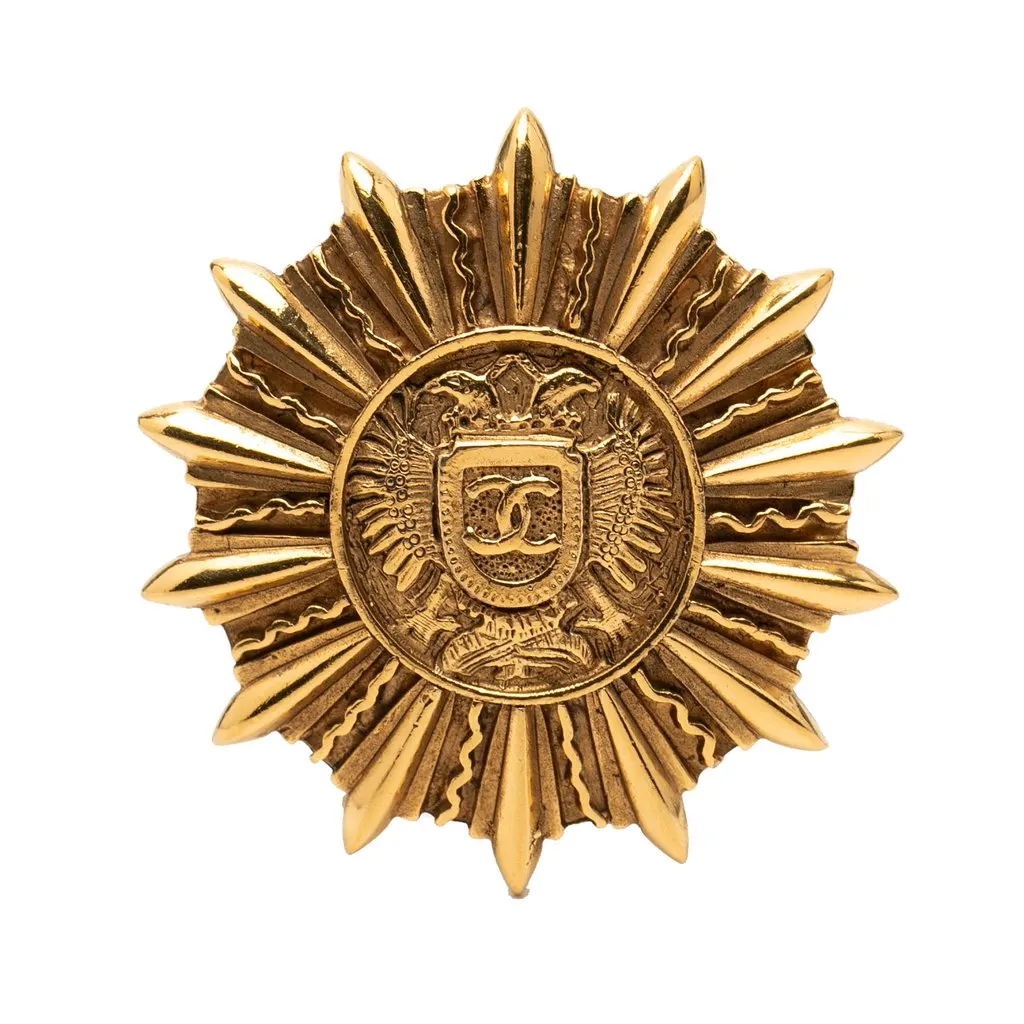 Chanel Gold Plated Sunburst Shield Brooch Gold Metal Very good - Front View