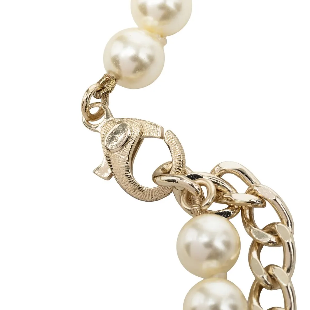 Chanel CC Brass No 5 Strass and Faux Pearl Pendant Necklace Gold Metal Very good - Model View