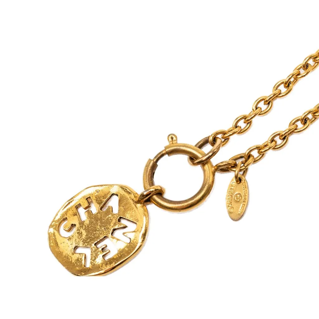 Chanel Gold Plated Cut Out Logo Pendant Necklace Gold Metal Very good - Model View