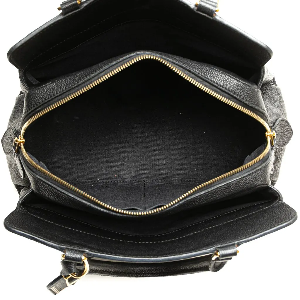 Louis Vuitton Monogram Empreinte Vosges MM Black Leather Good - Model View
