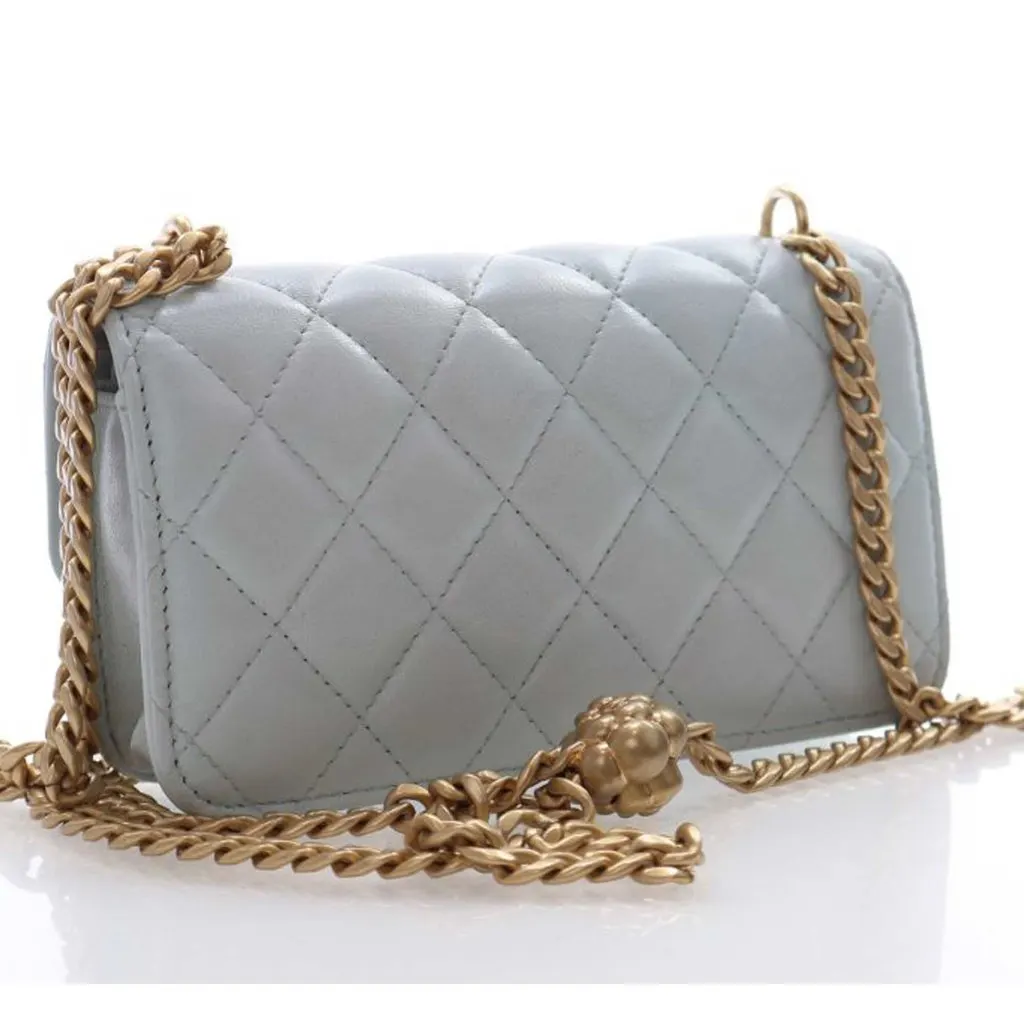 Chanel Mini CC Lambskin Camellia Crush Clutch With Chain Blue Leather Very good - Model View