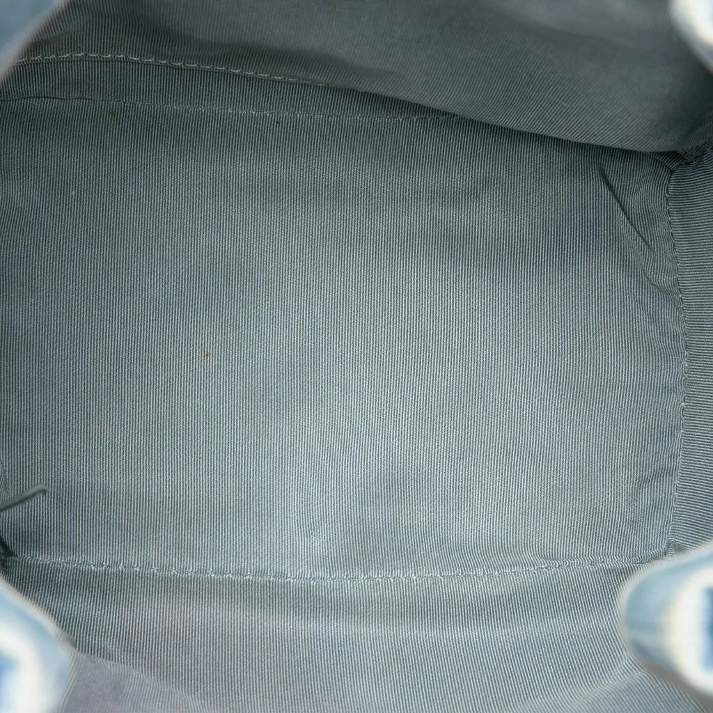 Chanel Quilted Denim Urban Spirit Bucket Bag Blue Denim Good - Model View