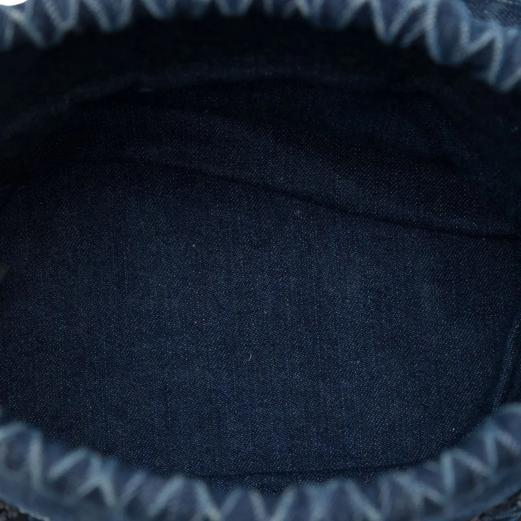 Chanel CC Woven Denim and Raffia Drawstring Bucket Bag Blue Very good - Model View
