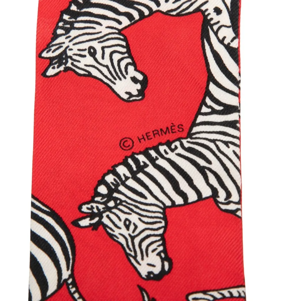 Hermès Les Zebres Silk Twilly Scarf Red Silk Very good - Model View