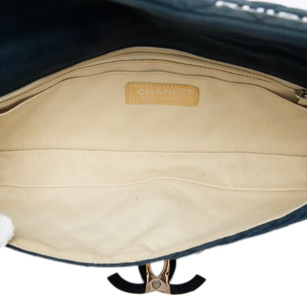 Chanel Quilted Canvas CC Cruise East West Flap Clutch Blue Very good - Model View