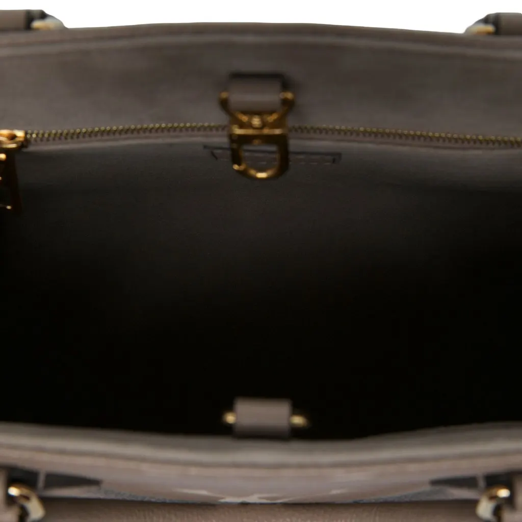 Louis Vuitton Bicolor Monogram Empreinte Giant OnTheGo PM Brown Leather Very good - Model View