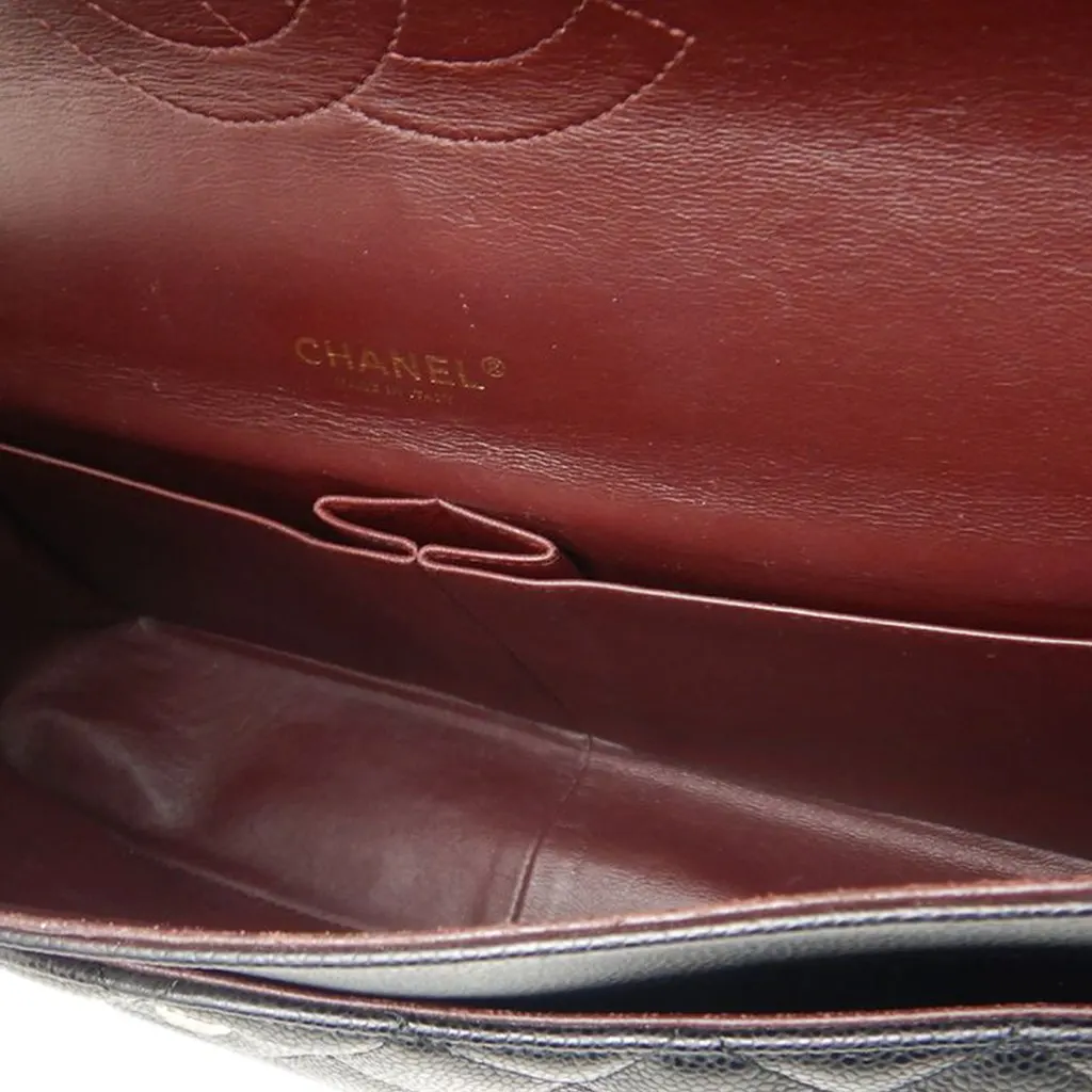 Chanel Maxi Classic Caviar Double Flap Black Leather Very good - Model View
