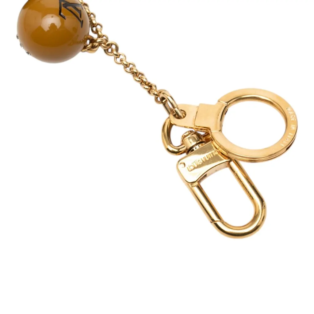 Louis Vuitton Gold Plated Strass and Resin Jack and Lucie Key Holder and Bag Charm Gold Metal Very good - Model View
