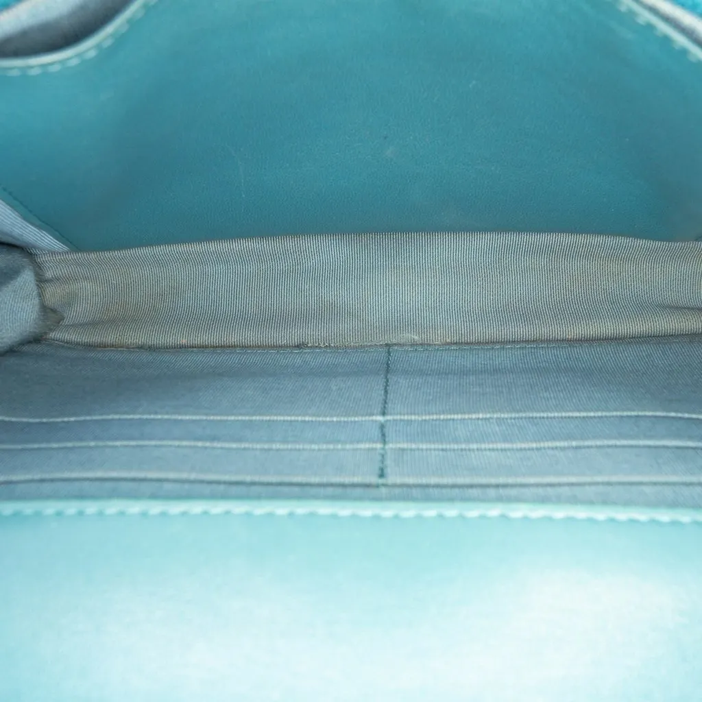 Chanel CC Quilted Lambskin Wallet On Chain Blue Leather Good - Model View
