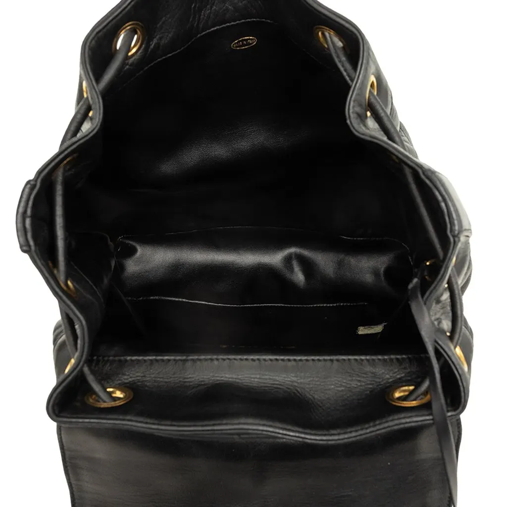Chanel Large CC Quilted Lambskin Drawstring Backpack Black Leather Good - Model View