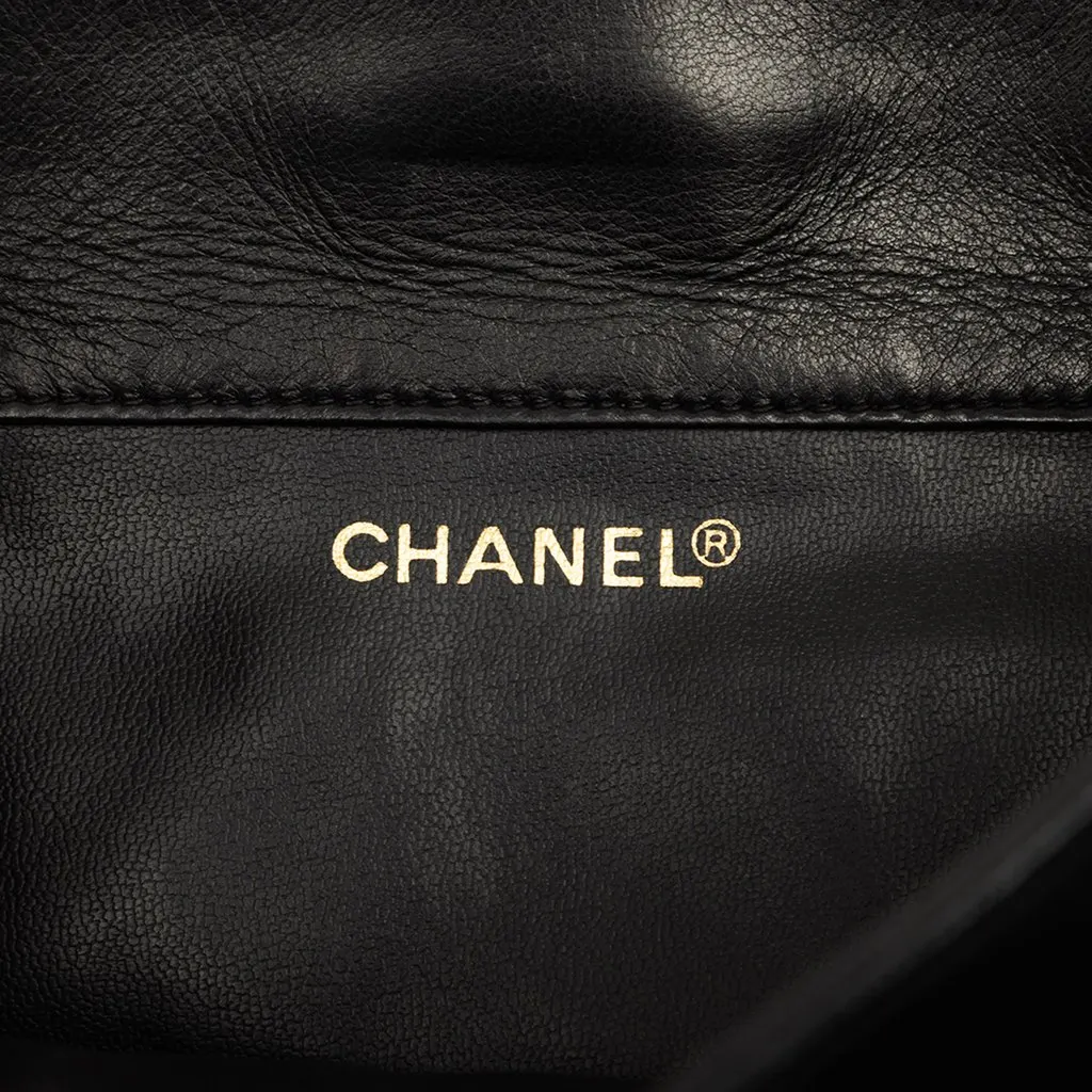 Chanel Large CC Quilted Lambskin Drawstring Backpack Black Leather Good - Box View